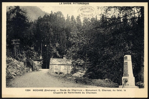Modane (environs). Monument E. Charvoz. Au fond, la chapelle de Notre-Dame du Charmaix